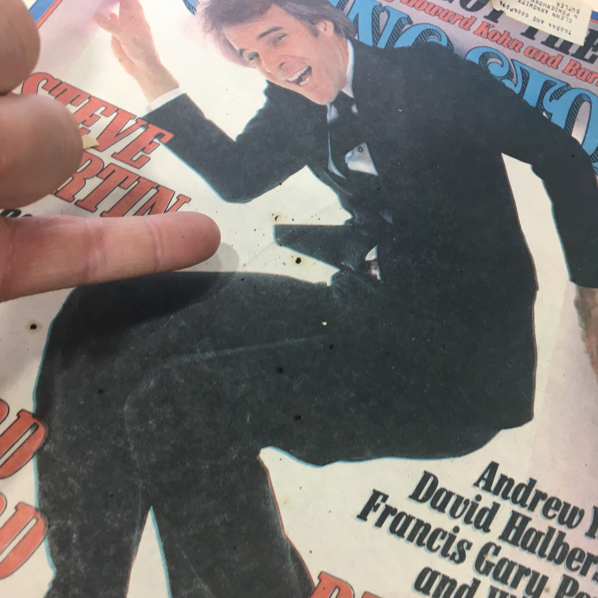 Cover image of Rolling Stone Magazine December 1, 1977, featuring stand-up comedian Steve Martin in a tuxedo, highlighting his energetic pose.