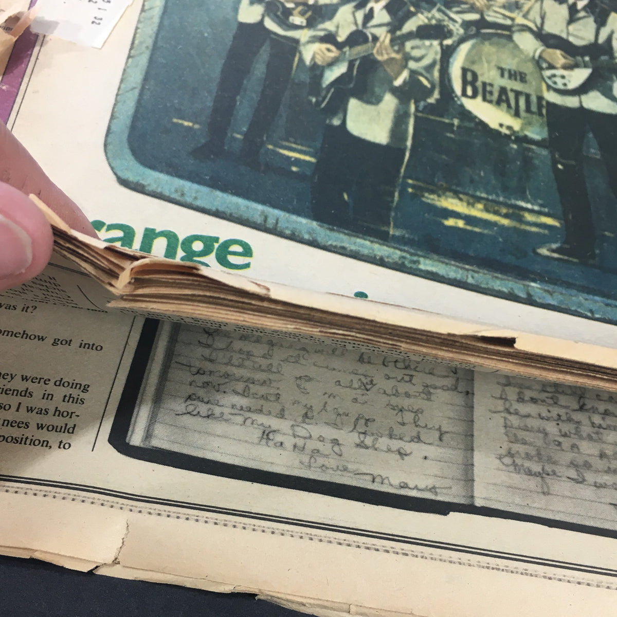An image showing the torn spine of the Vintage Rolling Stone Magazine from August 1, 1974, highlighting the condition of the pages and part of an article.