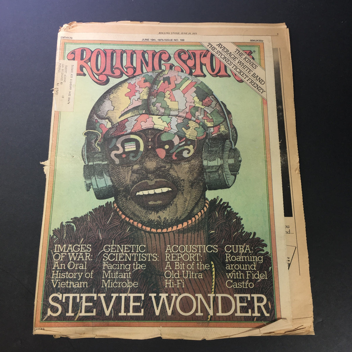 Cover of the VTG Rolling Stone Magazine from June 19, 1975, featuring Stevie Wonder, showcasing vibrant colors and a unique design.