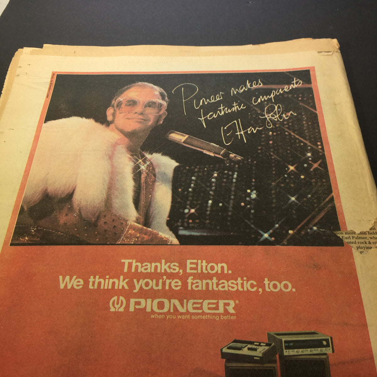 Vintage advertisement featuring Elton John from Rolling Stone Magazine June 19 1975, emphasizing the magazine's cultural significance and nostalgic appeal.