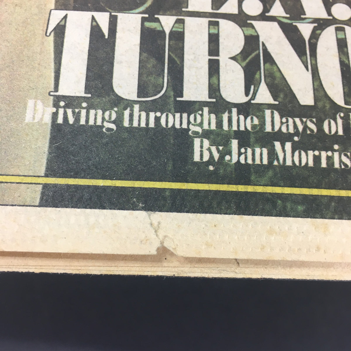 Detail of the back cover of the VTG Rolling Stone Magazine July 1, 1975, displaying articles by Jan Morris, with visible signs of age.