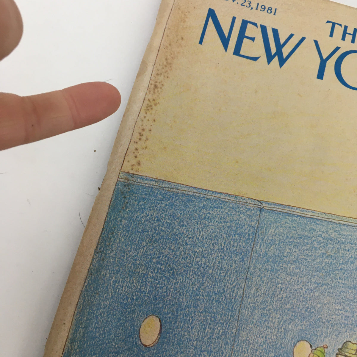 Close-up view of The New Yorker Magazine November 23 1981 cover highlighting minor wear and aging on the edge, maintaining its collectible value.