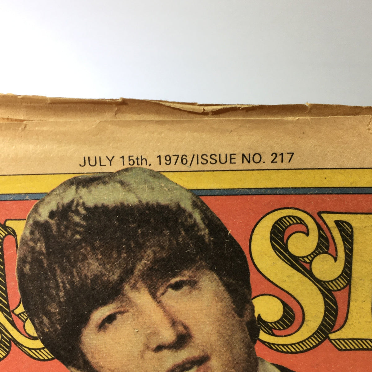 Detail of the publication date on VTG Rolling Stone Magazine July 15 1976, indicating issue number 217.