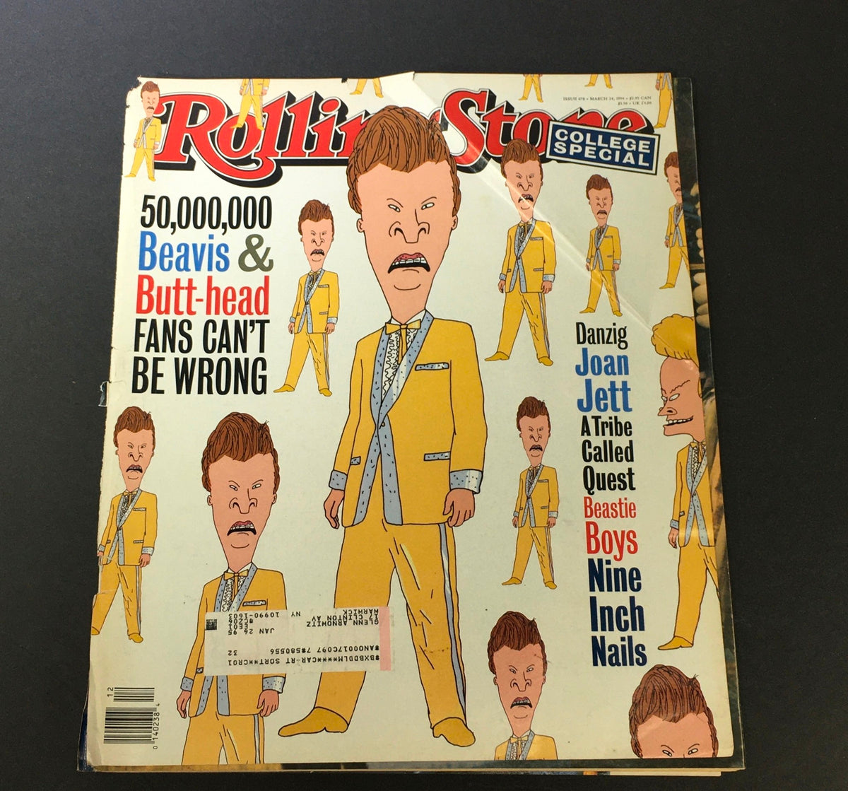Vintage 'Rolling Stone Magazine' cover from March 24, 1994, featuring Beavis and Butt-Head in humorous poses alongside Joan Jett. This college special issue highlights pop culture from the early 90s.