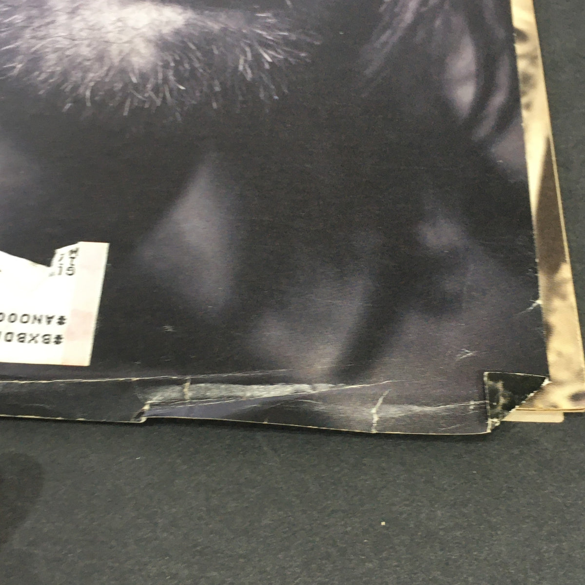 Close-up view of the Vintage Rolling Stone Magazine cover from June 2, 1994, highlighting the edges and wear with Kurt Cobain's image.