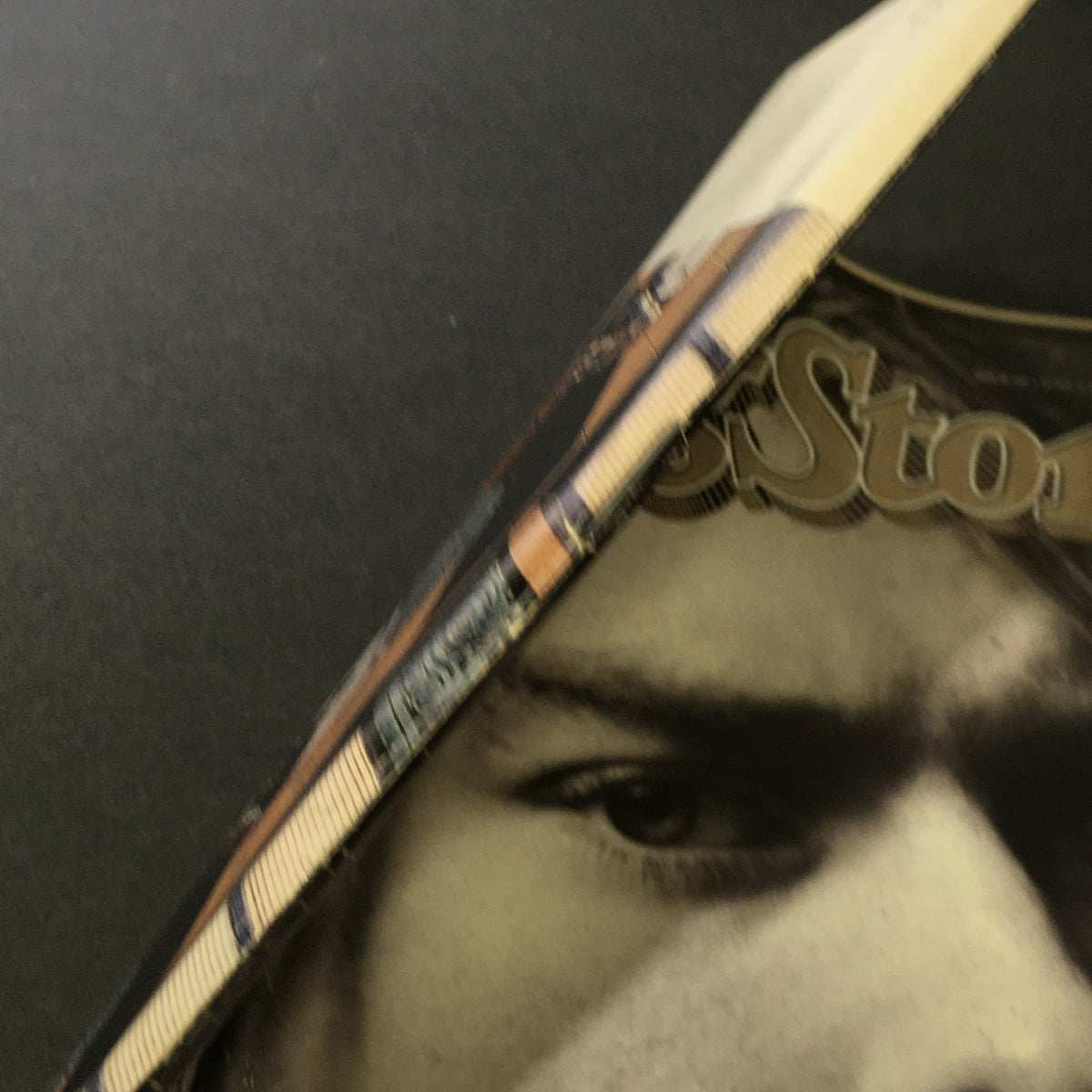 Close-up view of the VTG Rolling Stone Magazine from June 2, 1994, featuring a portrait of Kurt Cobain, highlighting its vintage condition and iconic cover design.