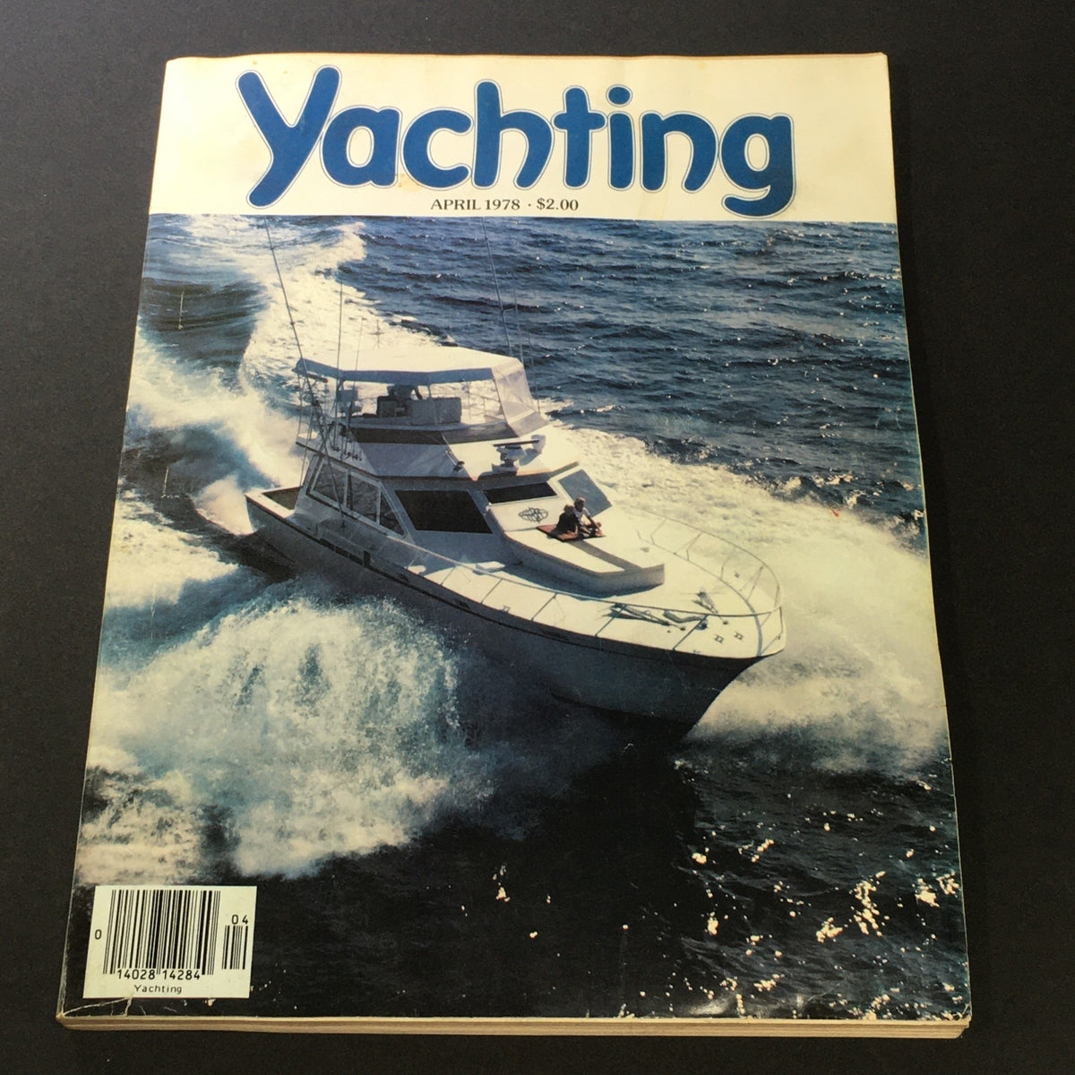 Cover of VTG Yachting Magazine April 1978 featuring a yacht navigating through waves, highlighting practical yachting and underwater photography.