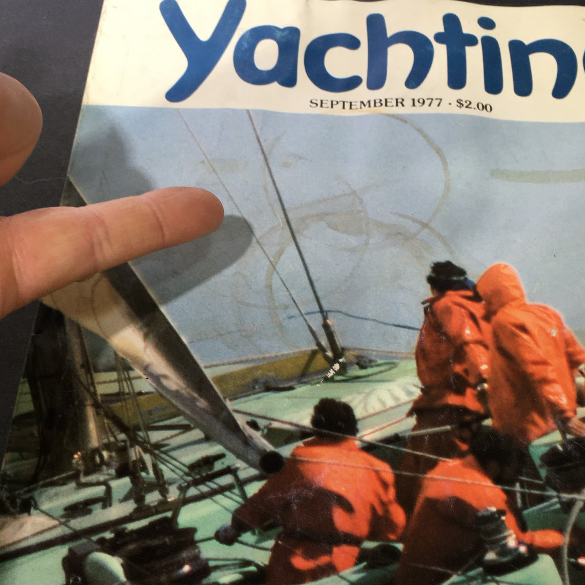 Close-up of the cover of VTG Yachting Magazine September 1977, showcasing the title and crew in red jackets, related to the 23rd Challenge of the America's Cup Series.
