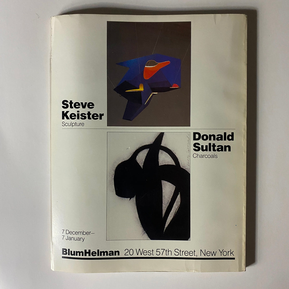 Event announcement from Art in America Magazine December 1983 for the exhibition of sculptures by Steve Keister and charcoals by Donald Sultan, emphasizing contemporary art in New York.