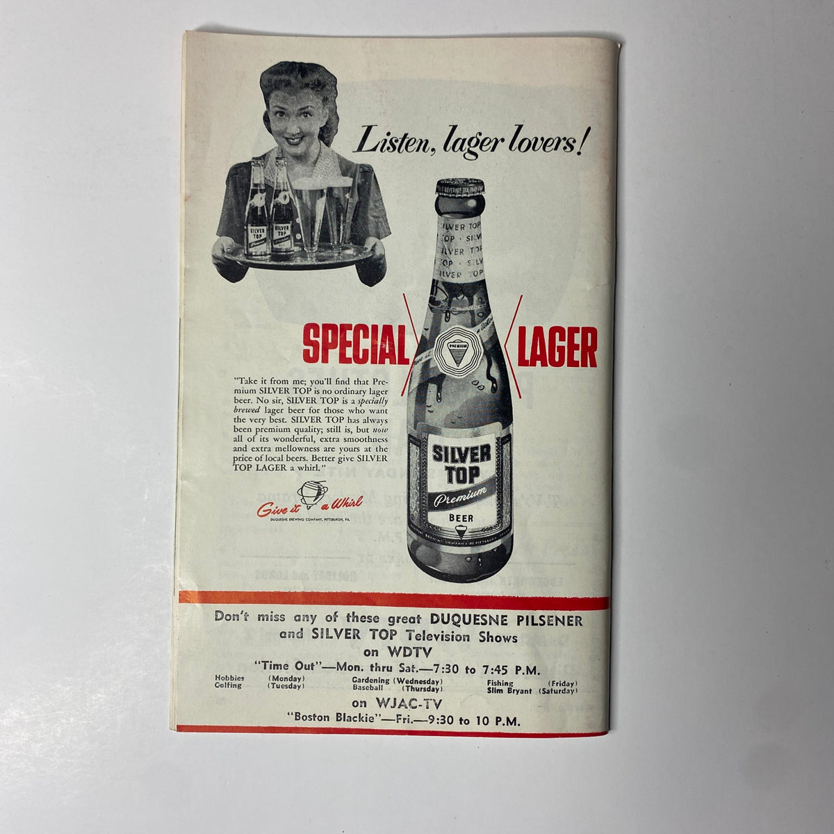 Advertisement for Silver Top Lager beer featuring a woman holding glasses of beer. The ad promotes Silver Top beer as a premium lager and lists local television programming on WDTV and WJAC-TV. This image is from the TV Digest Magazine dated May 30, 1953, highlighting Robert Cummings on the cover.