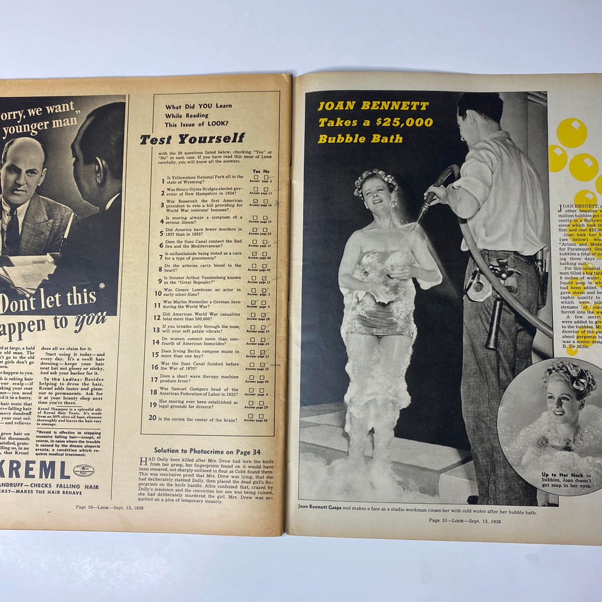 Double-page spread from Look Magazine, September 13, 1938 featuring actress Joan Bennett enjoying an elaborate bubble bath with a worker beside her.