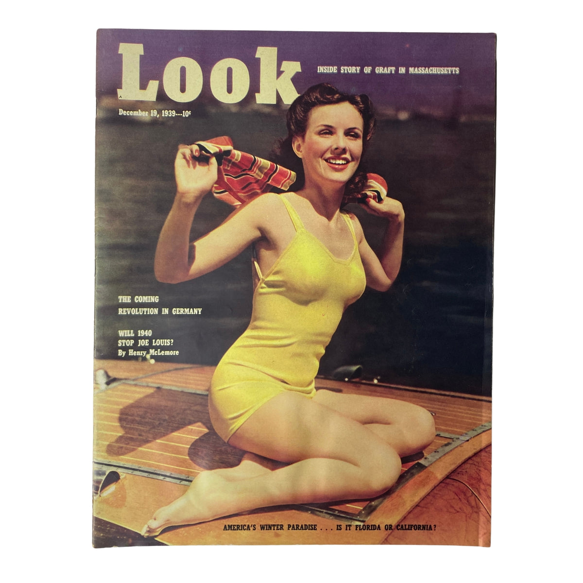 Look Magazine December 19, 1939 cover featuring a woman in a yellow swimsuit on a wooden boat, highlighting articles on the coming revolution in Germany and America's winter paradise.