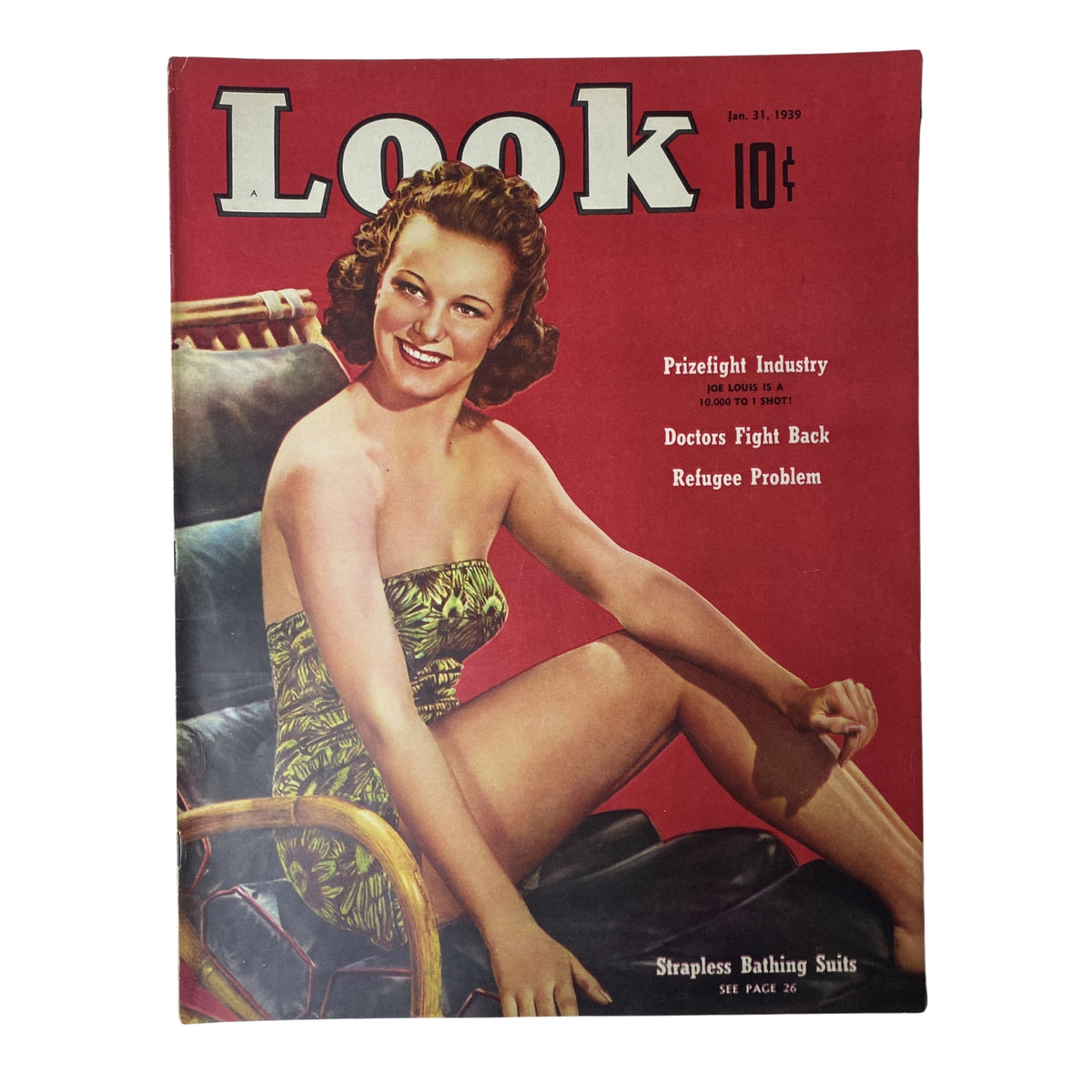 Cover of Look Magazine dated January 31, 1939, featuring a woman in a strapless bathing suit with a vibrant design, showcasing the fashion theme of the issue.