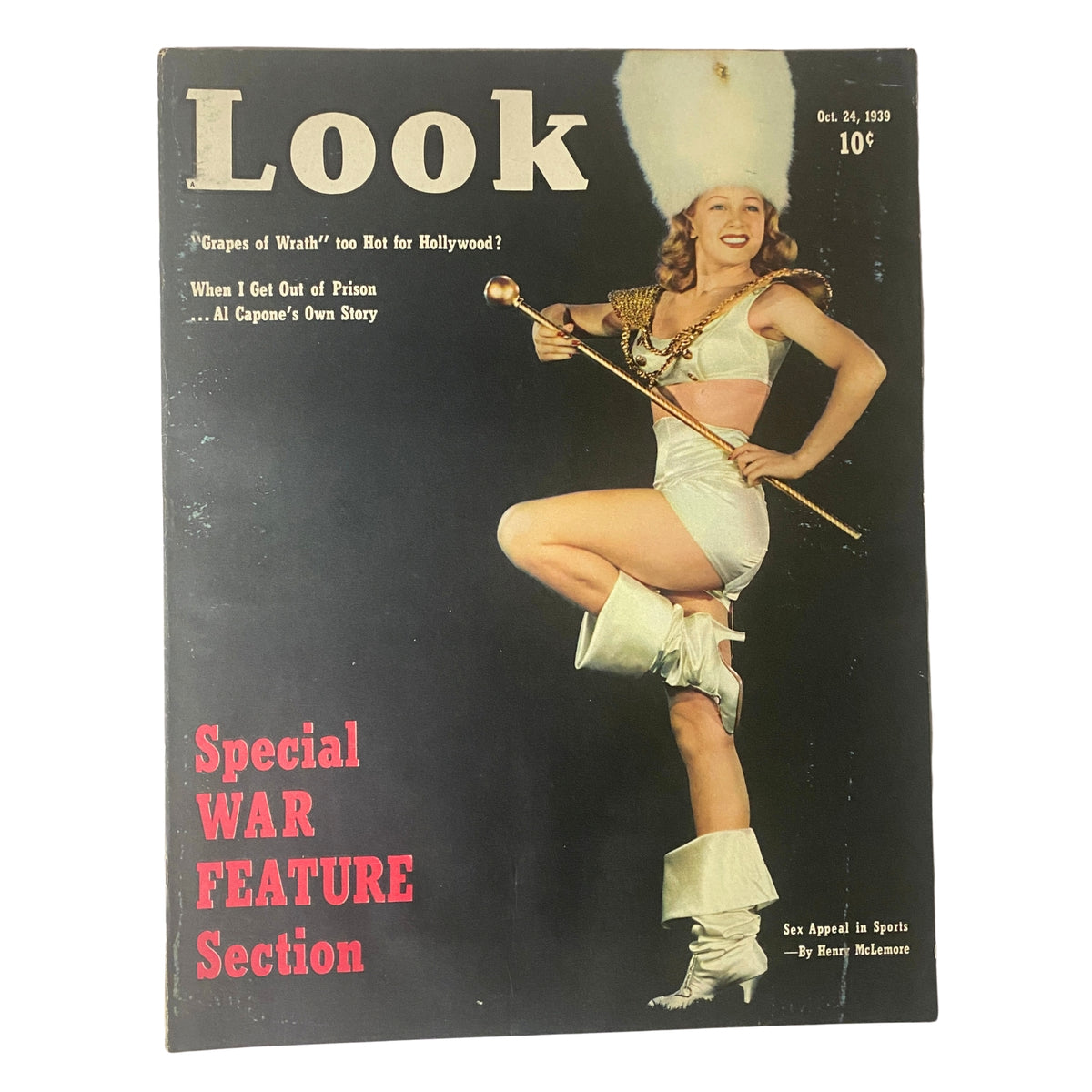 Cover of Look Magazine, October 24, 1939, featuring a performer in a striking costume, alongside the title and 'Special War Feature Section.'