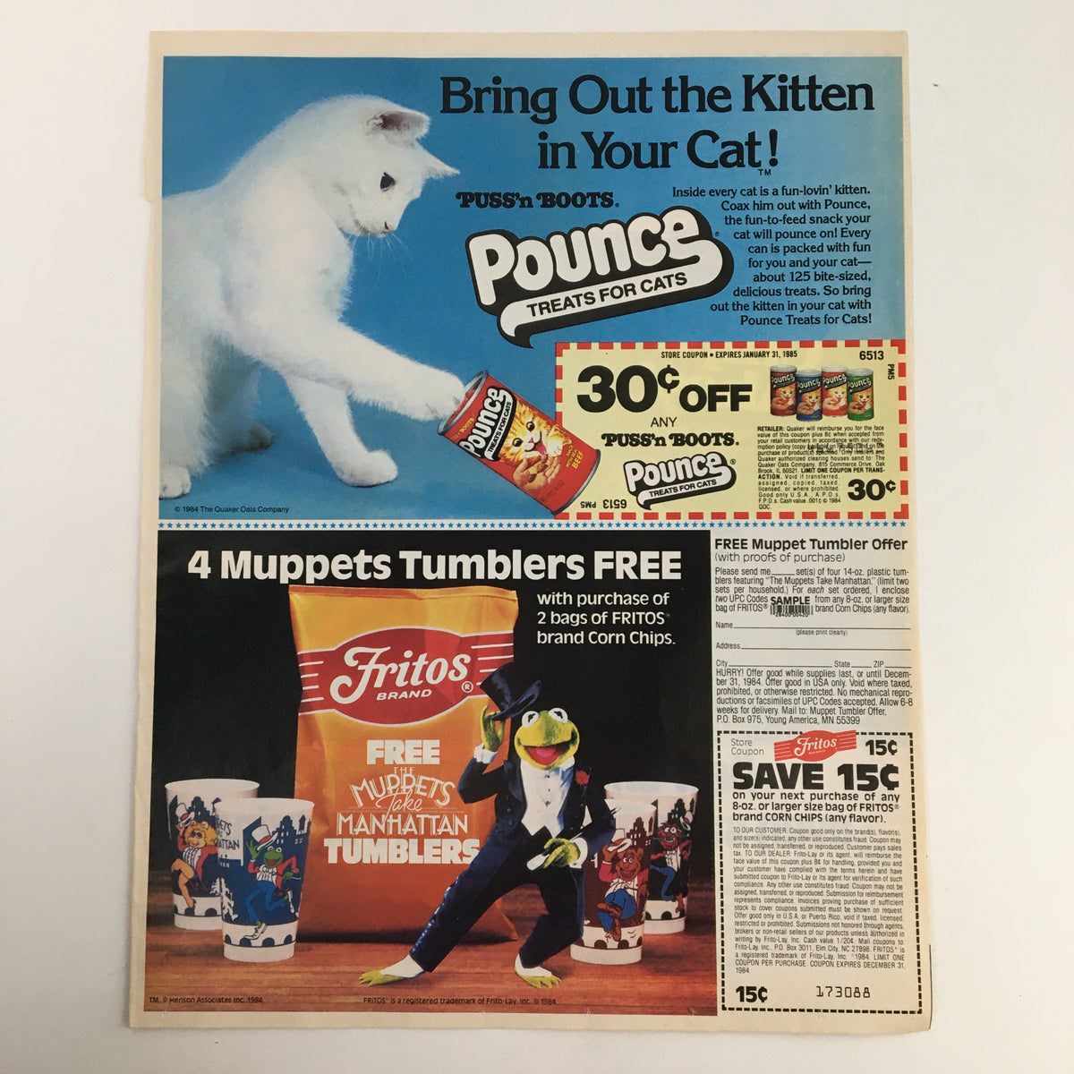 1990s advertisement showcasing various products including Pounce cat treats, Muppets Tumblers promotion, and a coupon offer, with a white cat featured prominently.