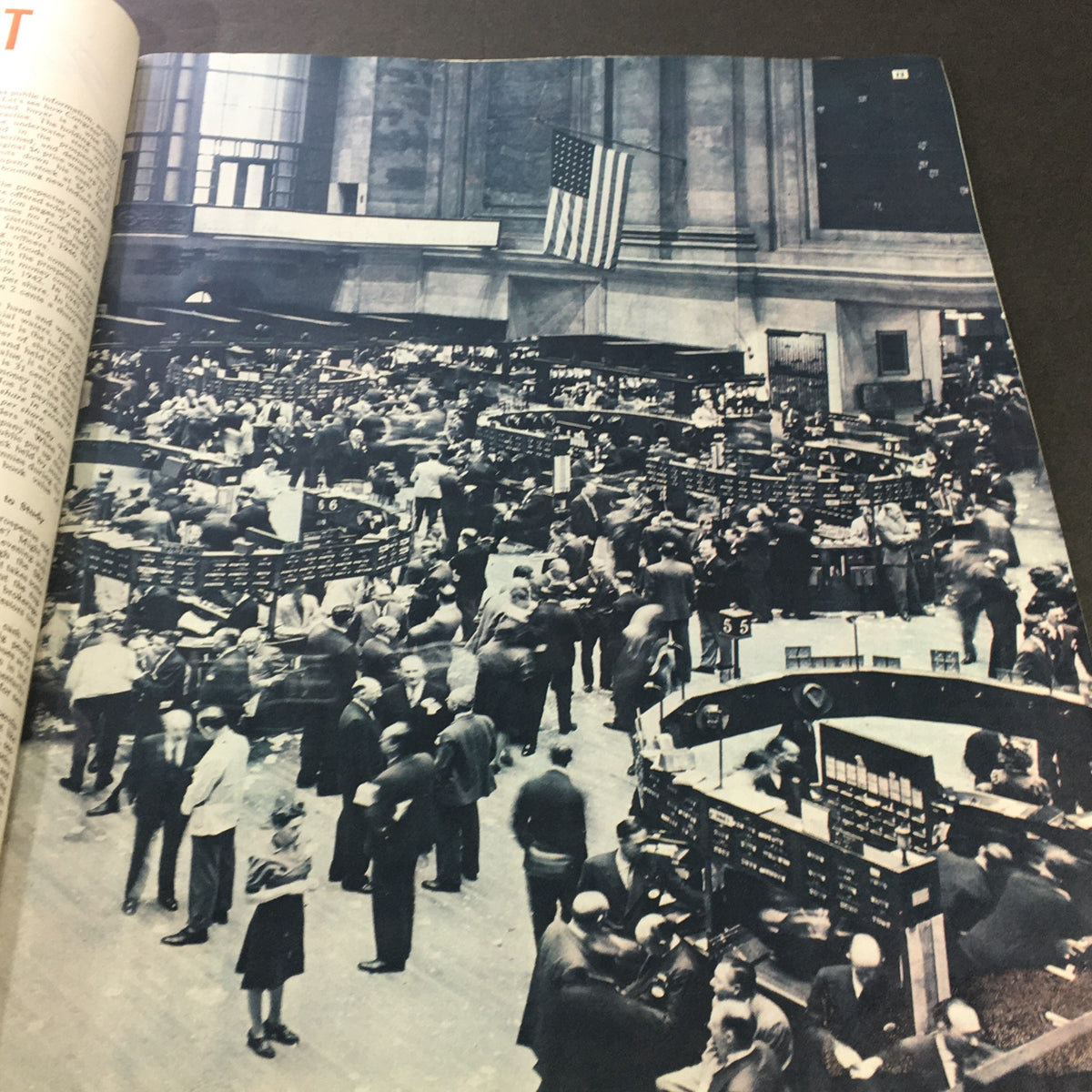Historical black and white photograph from VTG Collier's Magazine April 27 1946 depicting the bustling activity on the trading floor of Wall Street.