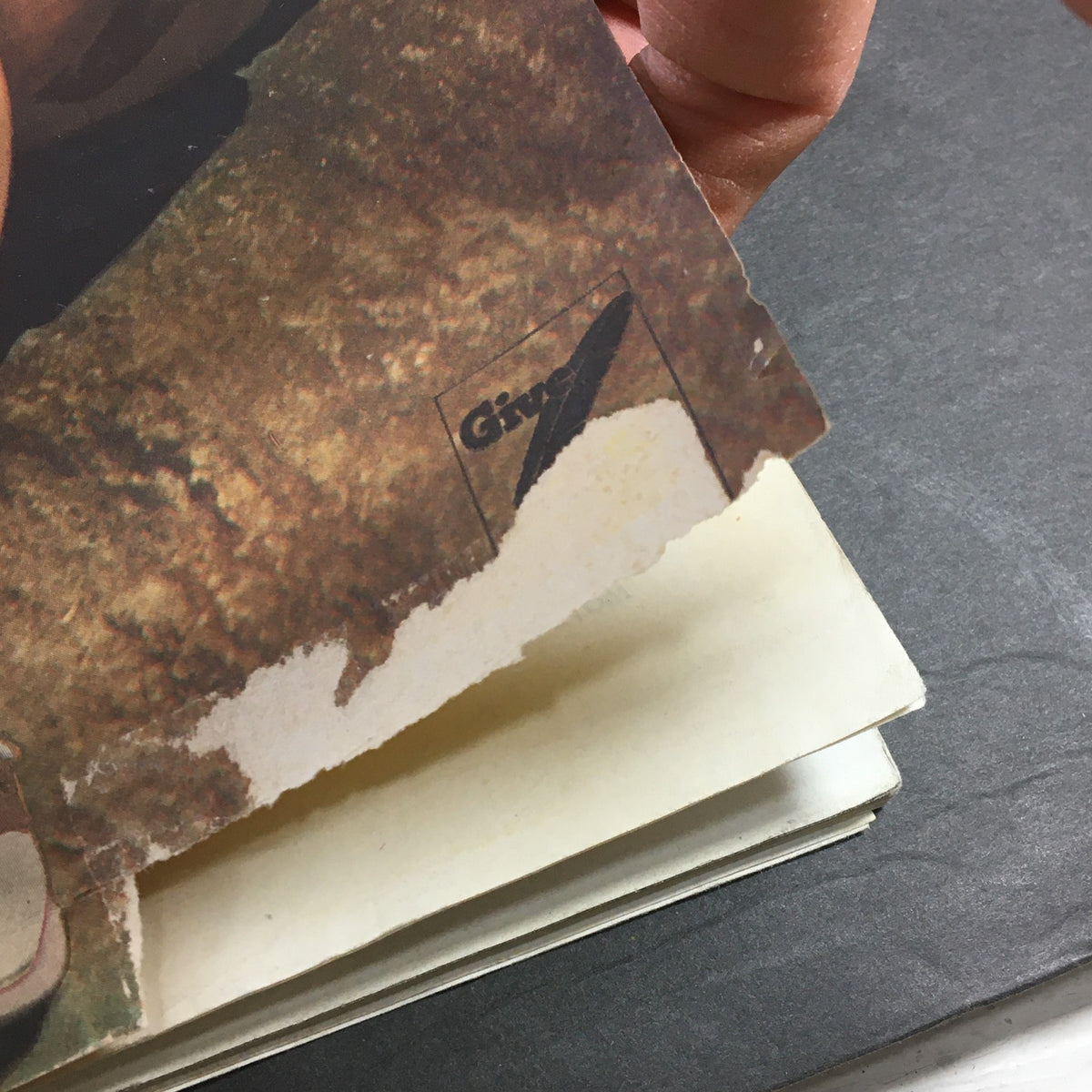 Close-up image of the corner of VTG Collier's Magazine October 4 1947 showing a torn edge with the Giovan brand logo.