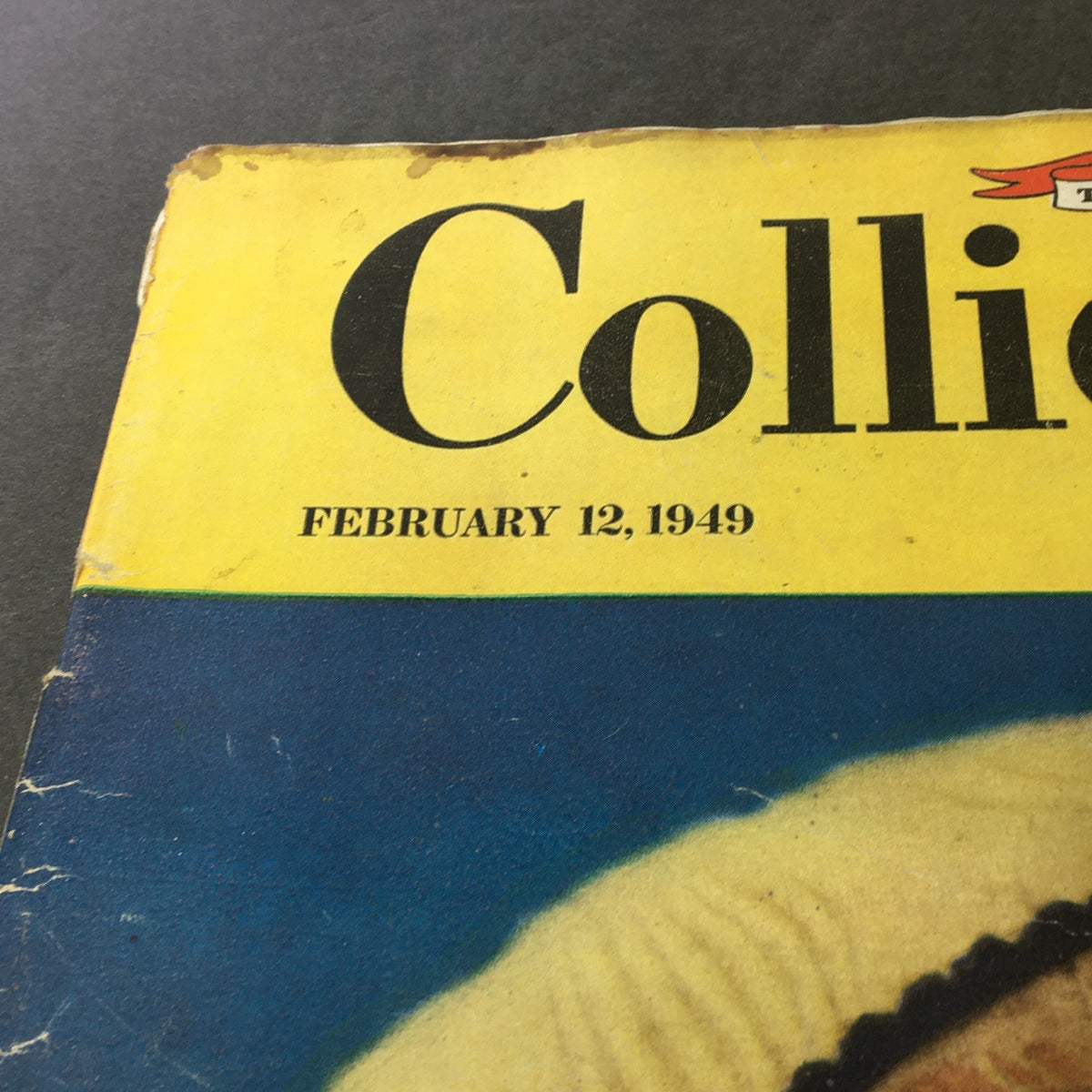 Close-up view of the cover of VTG Collier's Magazine February 12, 1949 showing the publication date and title in bold letters.