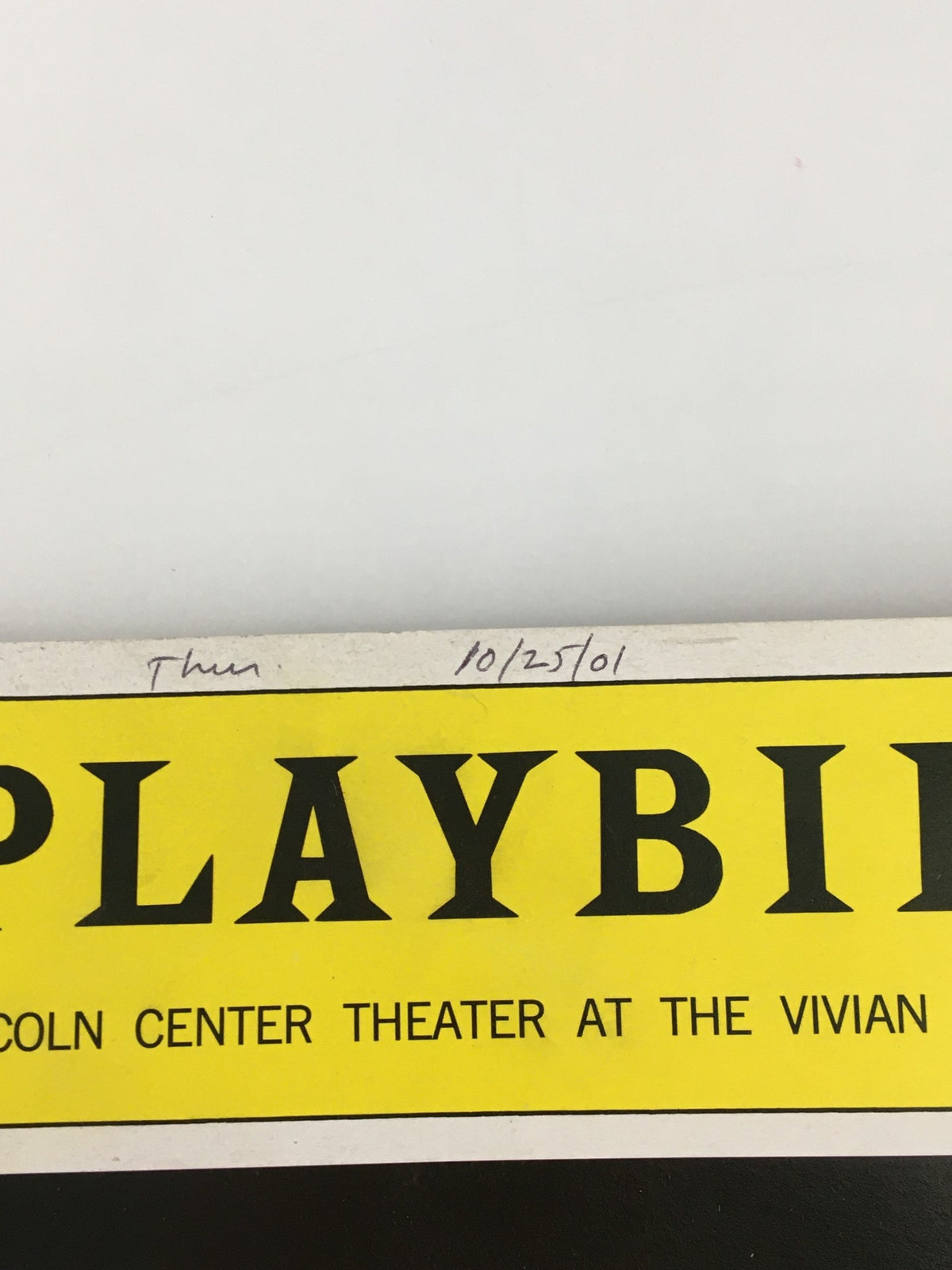 Close-up of the date written on the 2001 Playbill for Contact, indicating October 25, 2001.