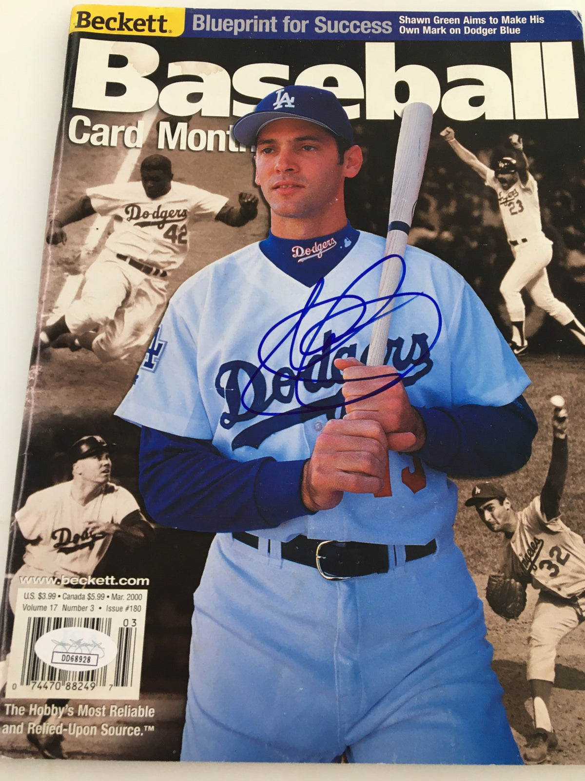 Shawn Green Beckett Baseball #180 March 2000 JSA Certified Autographed magazine cover with Shawn Green holding a baseball bat, wearing a Dodgers uniform.