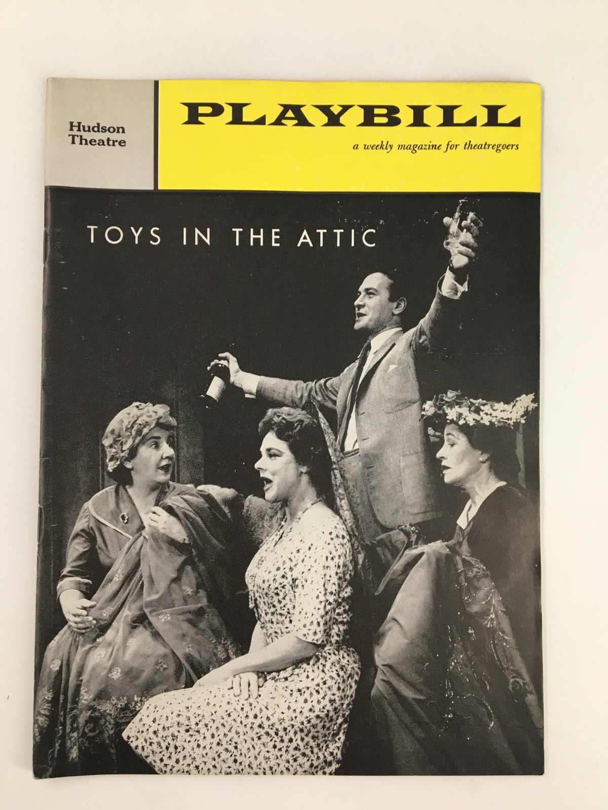 1961 Playbill Hudson Theatre featuring Maureen Stapleton in 'Toys In The Attic' showcasing the cast in a theatrical scene.