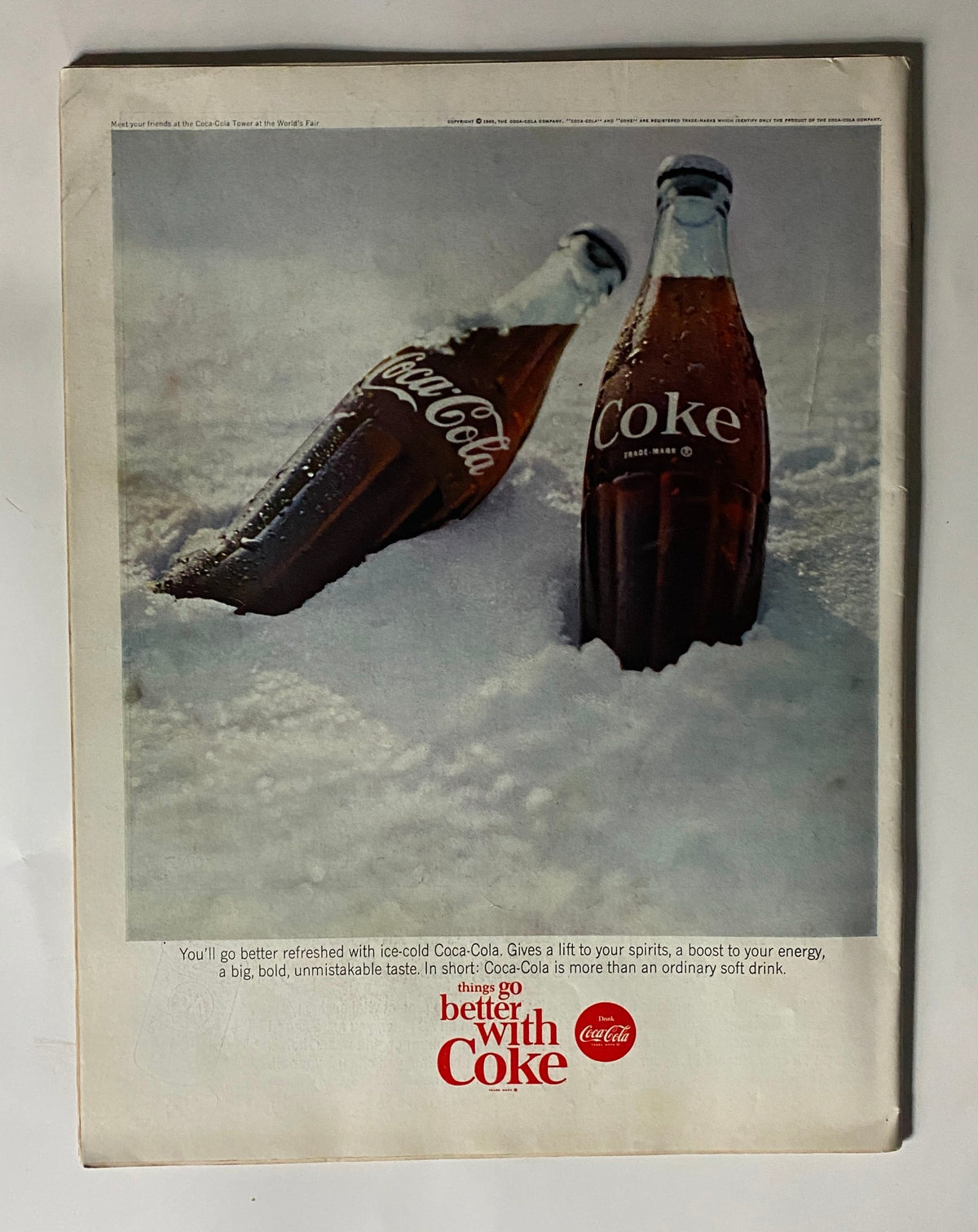 Back cover of the July 30, 1965 Life Magazine featuring a vintage Coca-Cola advertisement. The ad promotes Coca-Cola as a refreshing drink, emphasizing its unmistakable taste and the tagline 'things go better with Coke.'