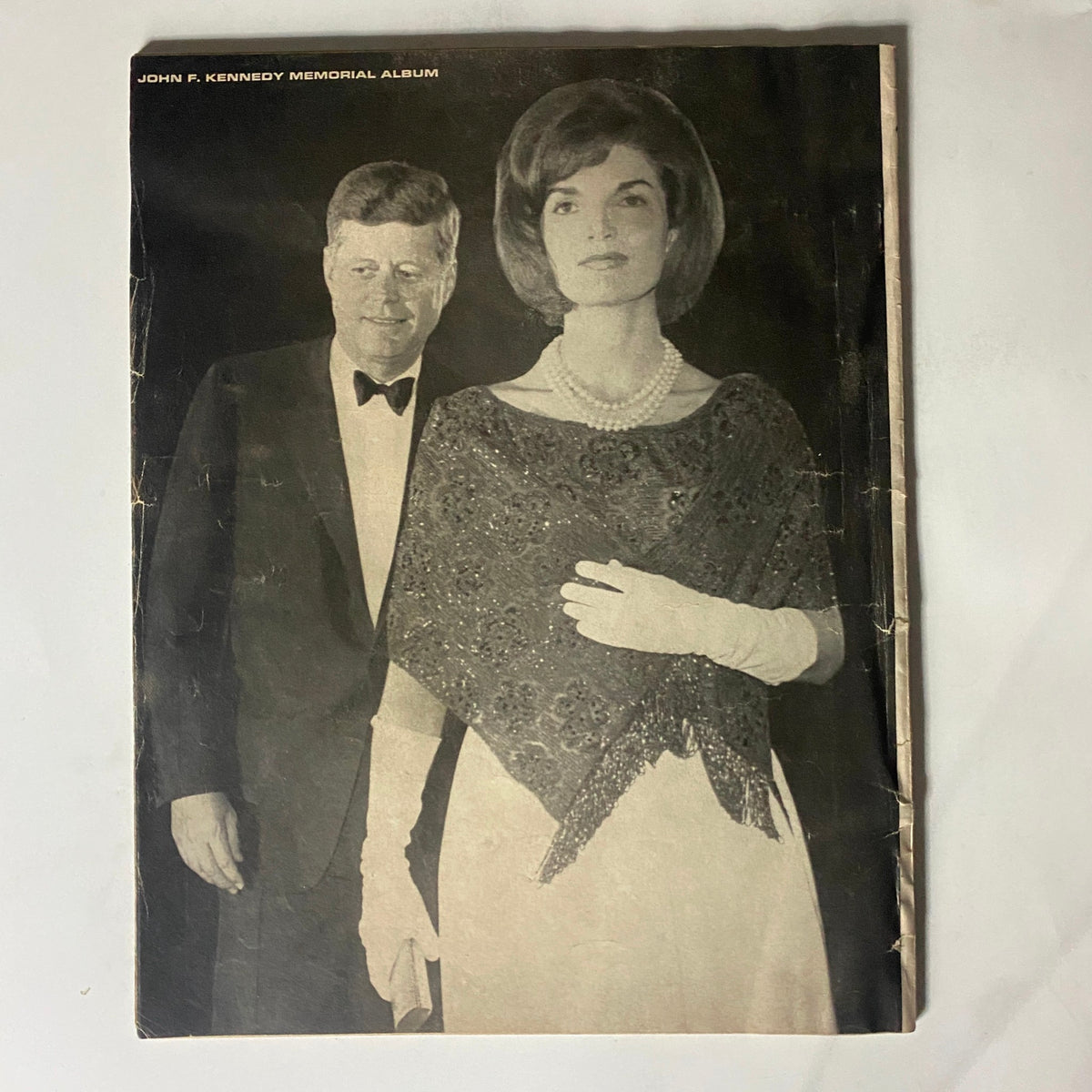 Back cover of the VTG 1964 John F. Kennedy Memorial Album featuring John F. Kennedy alongside Jacqueline Kennedy. This image reflects the couple’s elegance and contributes to the historical narrative of JFK's life.