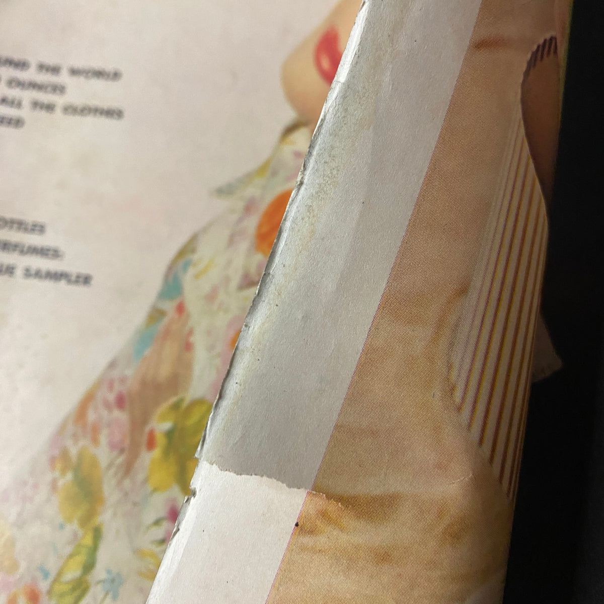 Close-up of the spine of Vogue Magazine June 1962, revealing light vintage wear and original printing details.