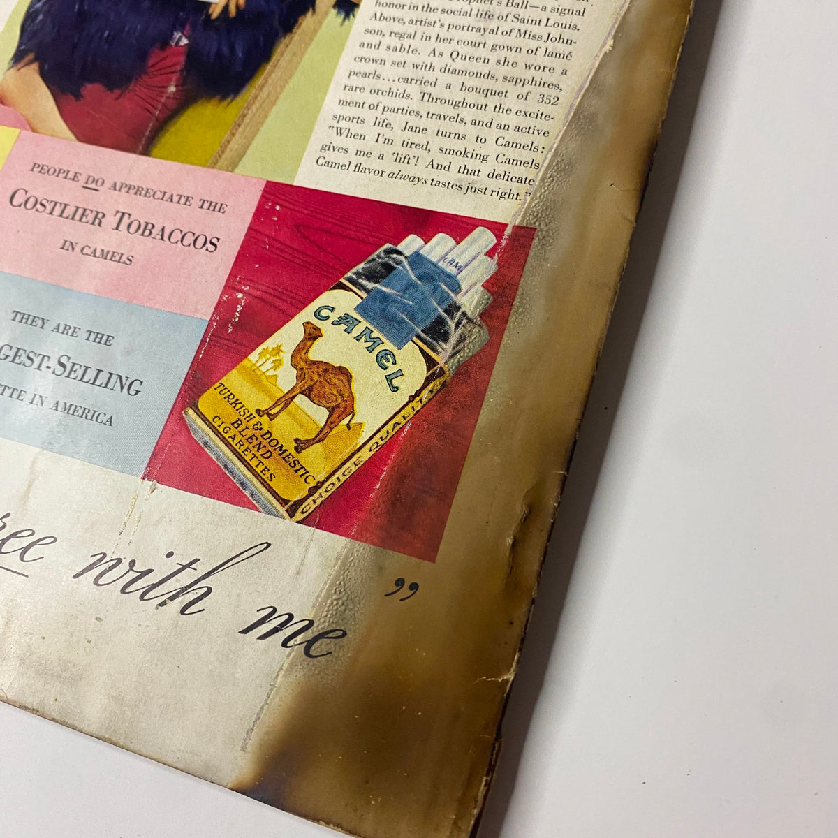 Vogue Magazine July 1, 1938 featuring an advertisement for Camel cigarettes, demonstrating vintage marketing aesthetics alongside a fashion narrative.
