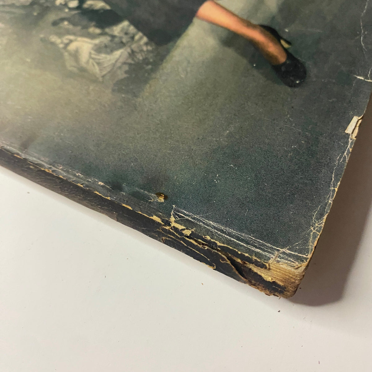 Damaged corner detail of the cover of Vogue Magazine August 15, 1947, showcasing model Joan Petit by Frances McLaughlin-Gill.