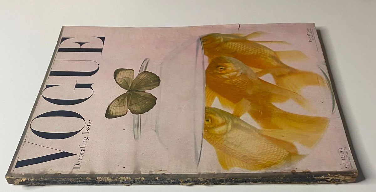 Cover of Vogue Magazine April 15, 1947 Decorating Issue featuring goldfish and butterfly design, photographed by Irving Penn.