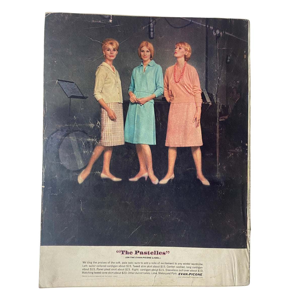 Back cover of Vogue Magazine November 1, 1961 Sondra Peterson Cover by Horst P. Horst, featuring three models in pastel outfits with the caption 'The Pastelles'.