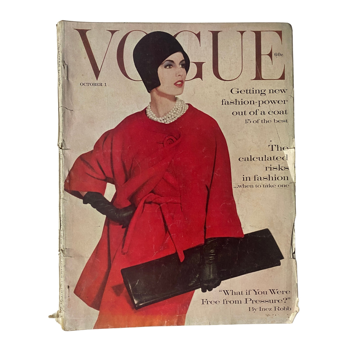 Cover of Vogue Magazine from October 1, 1960 featuring model Dorothy McGowan, photographed by Irving Penn. The cover showcases a striking red coat and bold fashion details, representing 1960s style innovation.