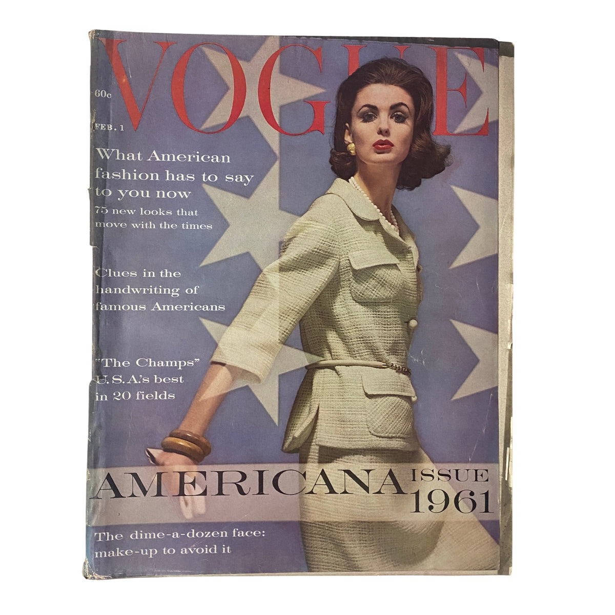 Vogue Magazine February 1, 1961 featuring a stylish cover design showcasing a model in an elegant outfit, representing the Americana theme. The magazine highlights American fashion and cultural insights from the early 1960s.