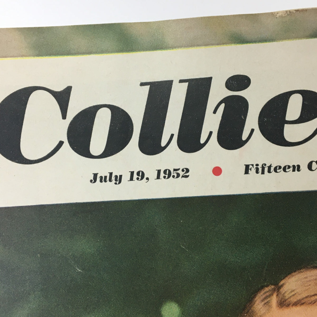 Close-up of the title and date of VTG Collier's Magazine July 19 1952, showcasing vintage typography and design.