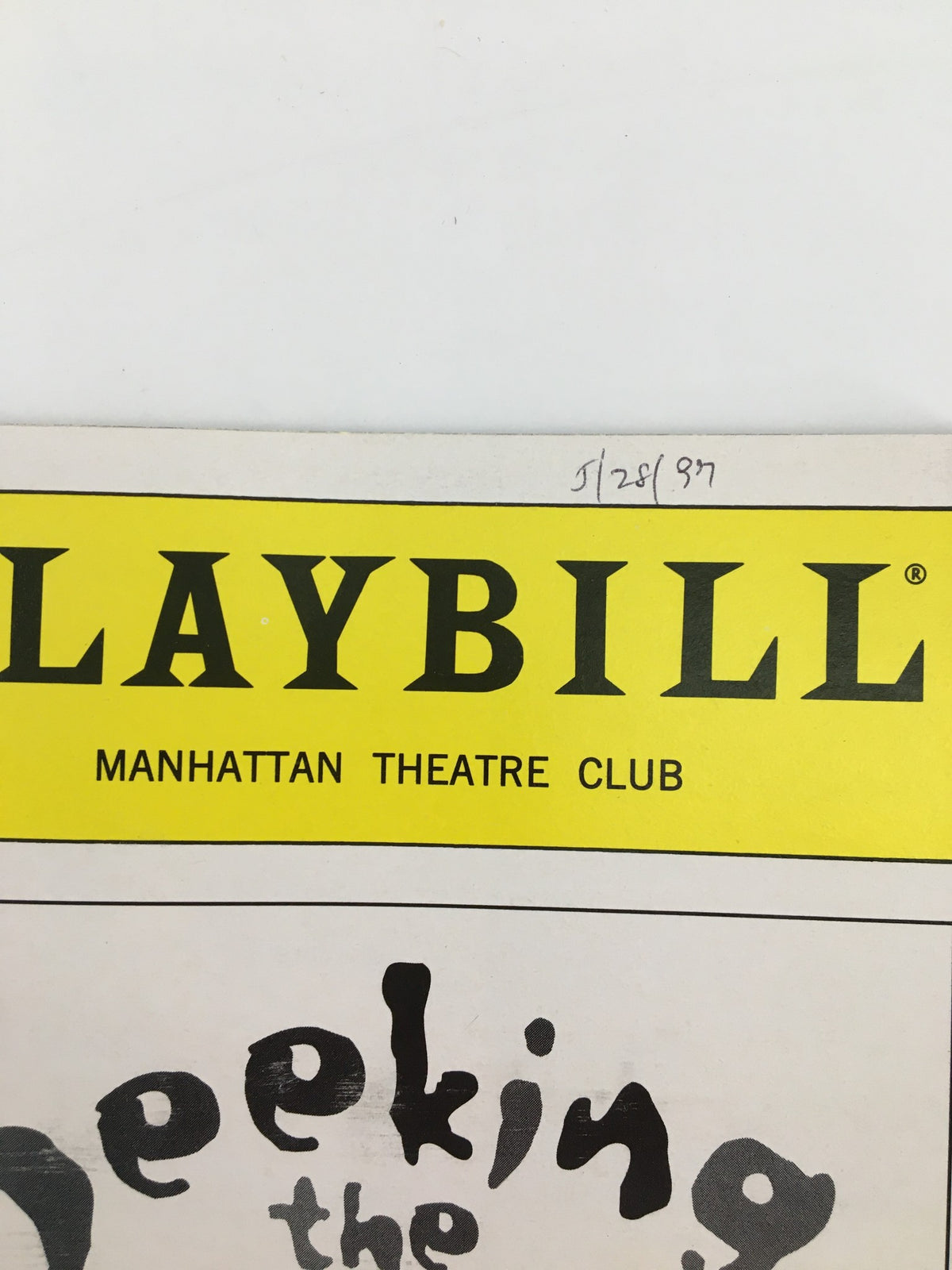 Detail of the 1997 Playbill for Seeking the Genesis showing the header with Manhattan Theatre Club and a date written in pencil.