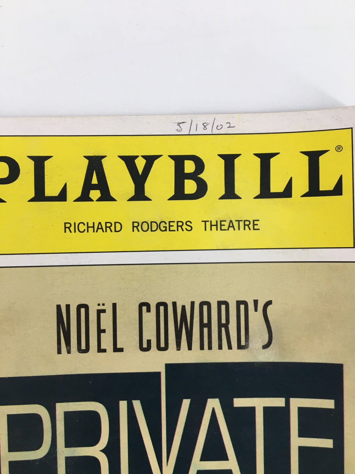 Close-up of the 2002 Playbill for Richard Rodgers Theatre showcasing 'Private Lives' with date 5/18/02.