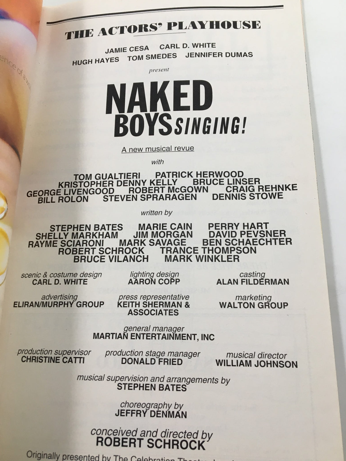 Page featuring the cast and creative team of 'Naked Boys Singing' presented at The Actors' Playhouse in the 2001 Playbill, showcasing Tom Gualtieri and other performers.