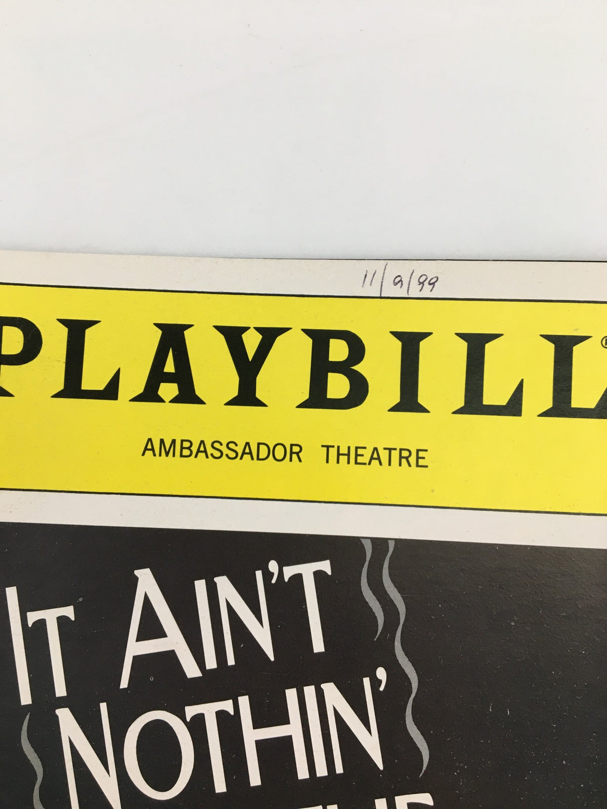 Close-up of the 1999 Playbill from Ambassador Theatre with the title 'It Ain't Nothin' But The Blues' and the theatre's logo.
