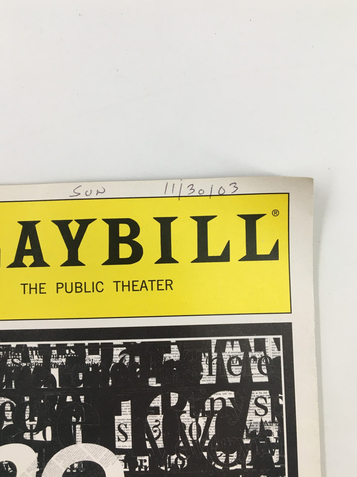 Close-up of the top section of the 2003 Playbill for The Story by Tracey Scott Wilson, highlighting the date '11/30/03' handwritten at the corner.
