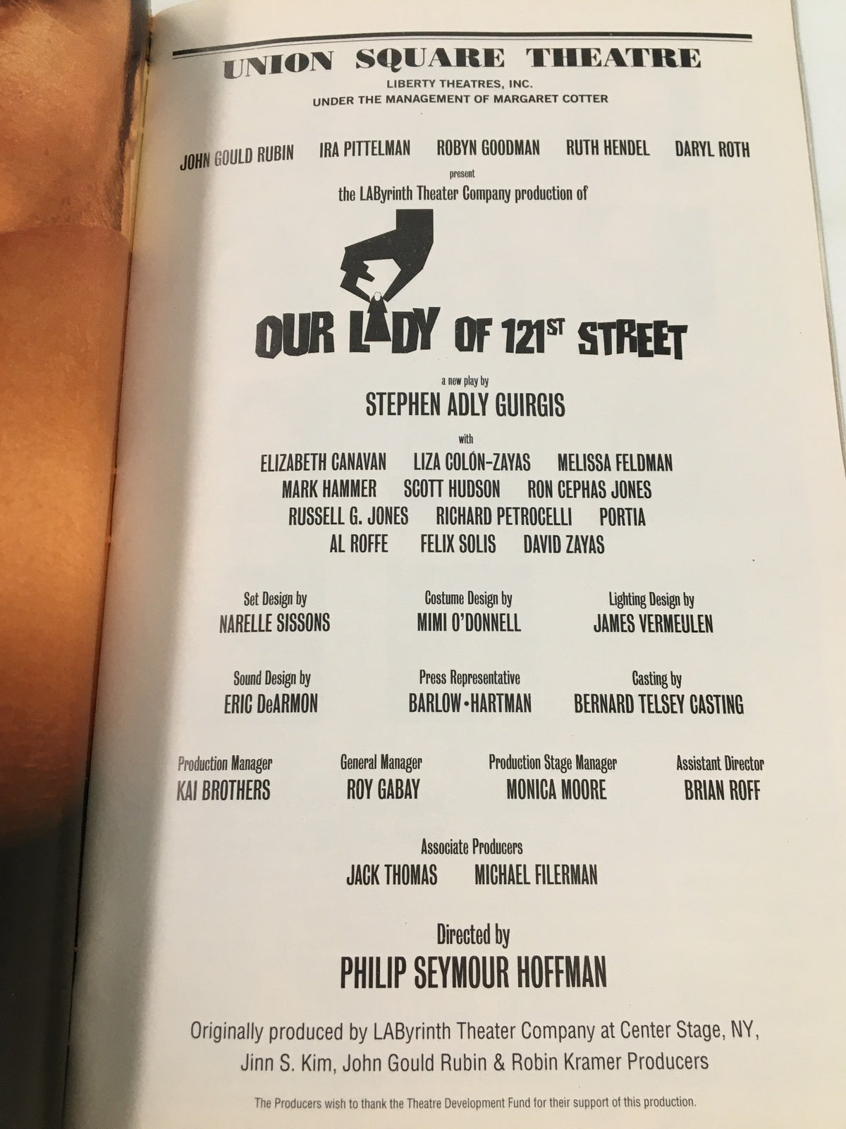 Casting page of the 2003 Playbill for 'Our Lady of 121st Street' at Union Square Theatre, showcasing the talented cast including Elizabeth Canavan, along with production team details.