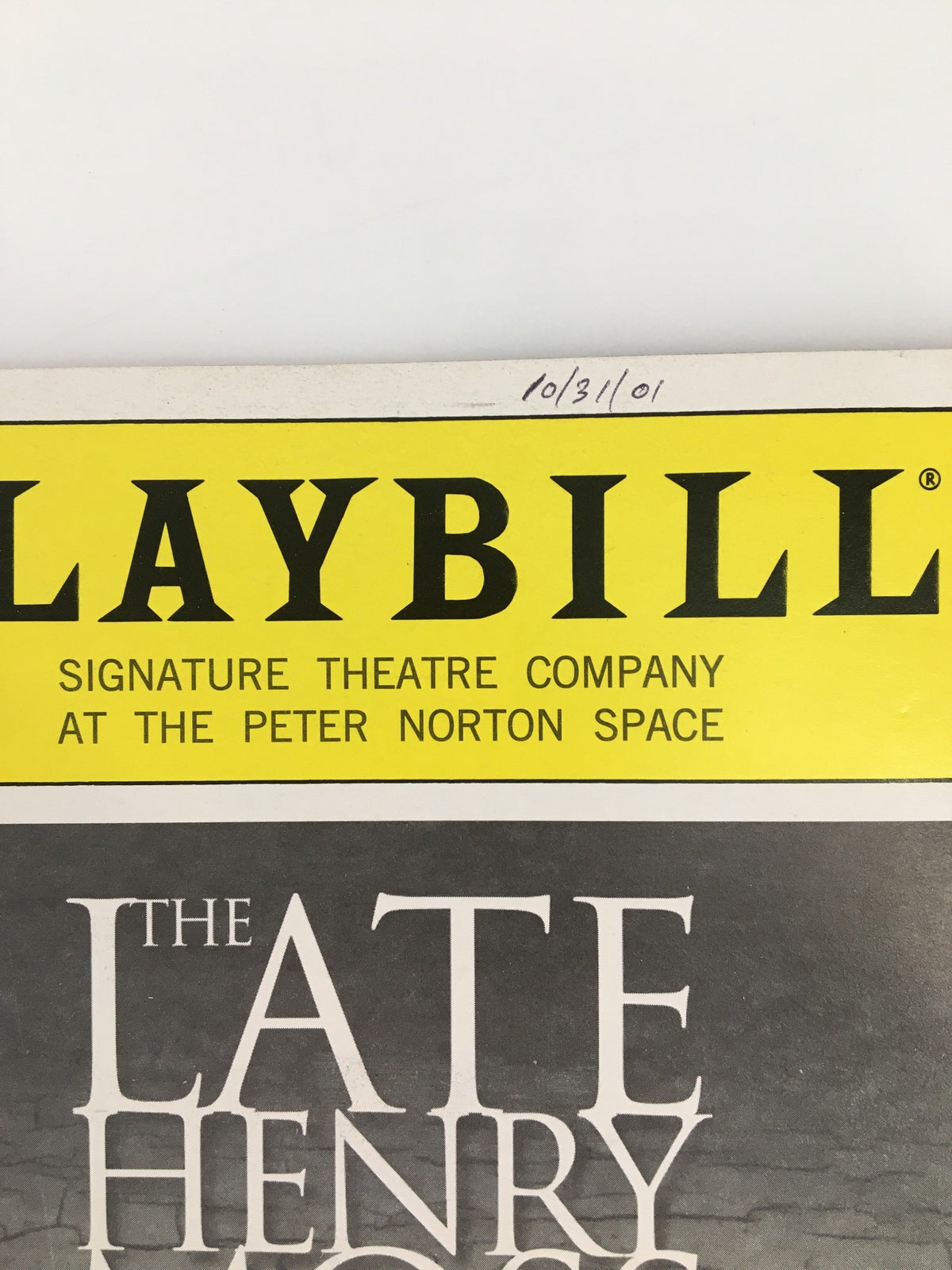 Close-up of the 2001 Playbill for The Late Henry Moss, highlighting the Signature Theatre Company logo with a date inscribed at the top.