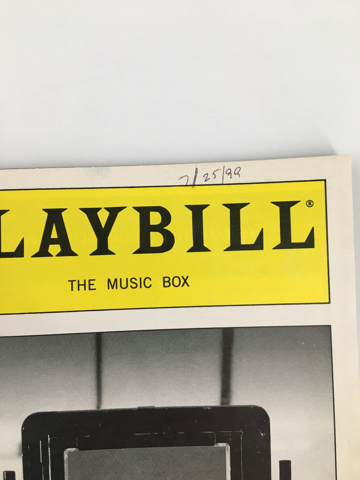 Close-up of the 1999 Playbill The Music Box header, featuring 'PLAYBILL' and the subtitle, with the date 7/25/99 handwritten.