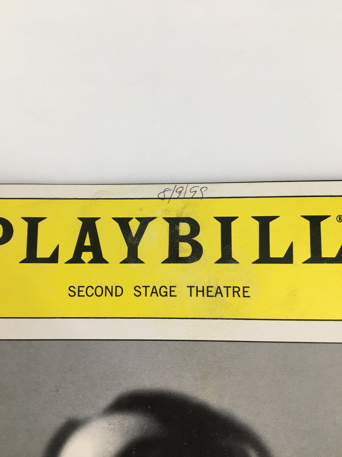 Close-up of the 1999 Playbill for Jar the Floor, showcasing the top with 'PLAYBILL' and 'SECOND STAGE THEATRE' printed, along with a handwritten date.