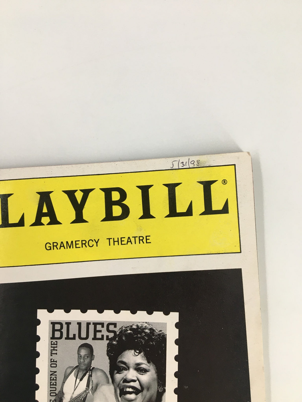 Close-up view of the 1998 Playbill for Dinah Was The Dinah Washington Musical, highlighting the 'Queen of the Blues' theme with imagery related to Dinah Washington.