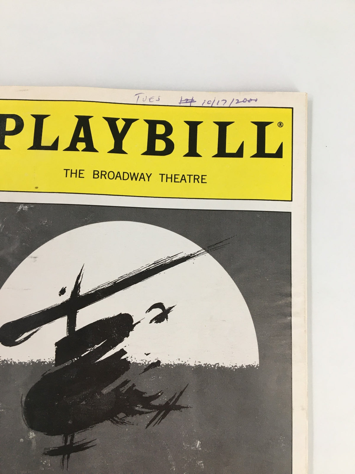 Close-up of the 2000 Playbill for Miss Saigon, highlighting Elizabeth Paw's role as Kim with detailed artwork and date annotation.