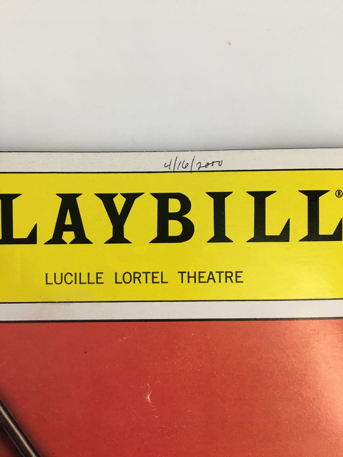 Top section of the 2000 Playbill for Lucille Lortel Theatre showing the date and logo.