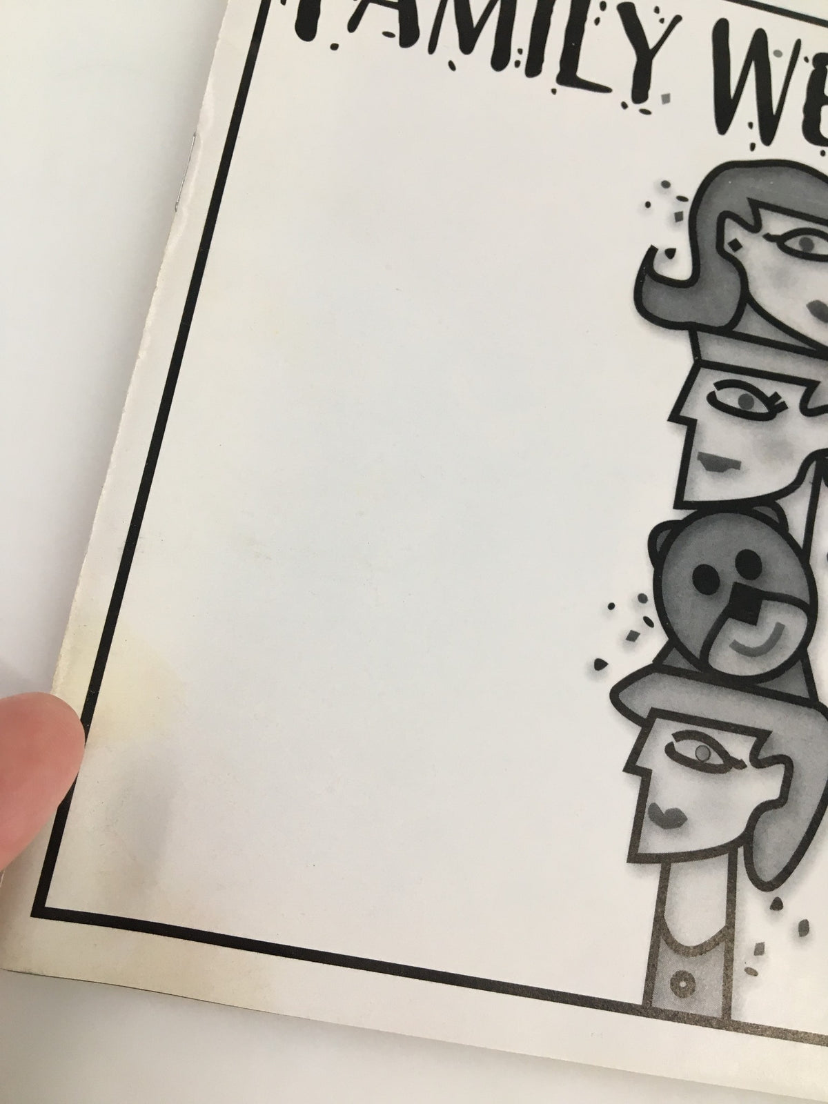Detail view of the side of the 2000 Playbill for Family Week, showing minor wear and unique character.