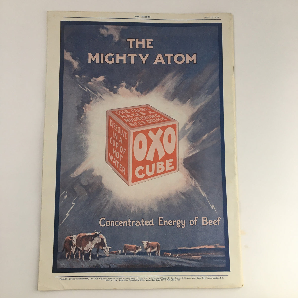 The Sphere Newspaper April 12, 1924 cover featuring a vintage advertisement for Oxo Cube, emphasizing its concentrated energy of beef, with cows grazing in the background.