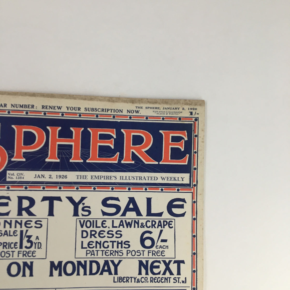 Close-up of The Sphere Newspaper January 2 1926 cover displaying details of Liberty's Sale with vintage typography and design.